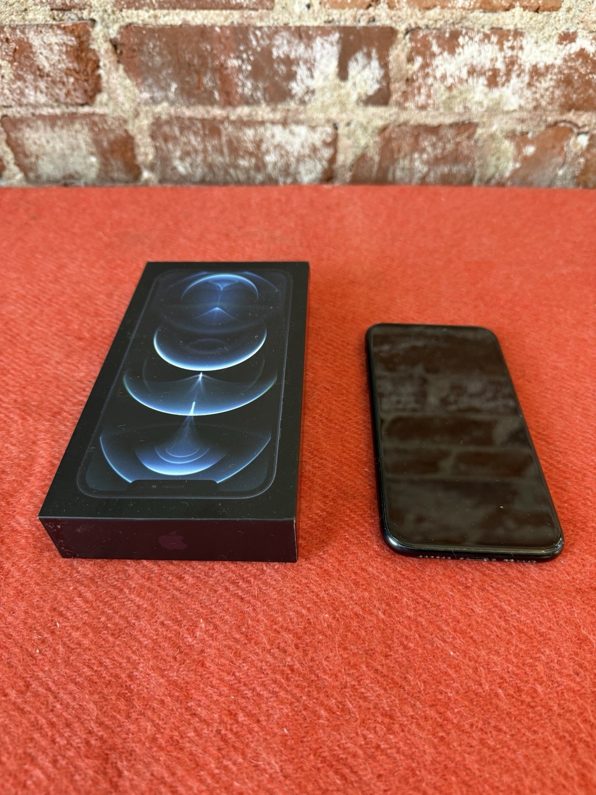 Two apple iPhones and two Apple Watches parts non working storage unit find