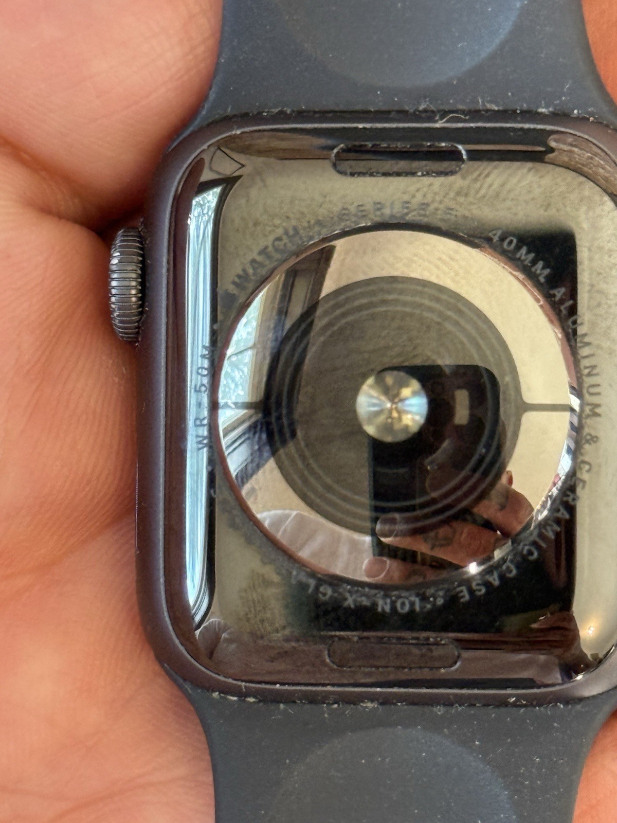 Two apple iPhones and two Apple Watches parts non working storage unit find