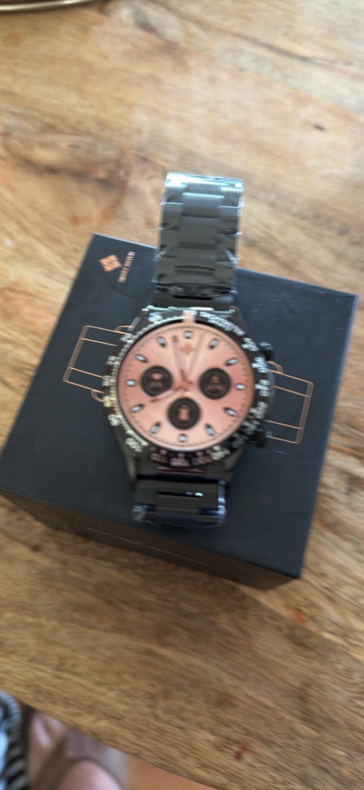 New smart watch with a black metal link band and circular face.