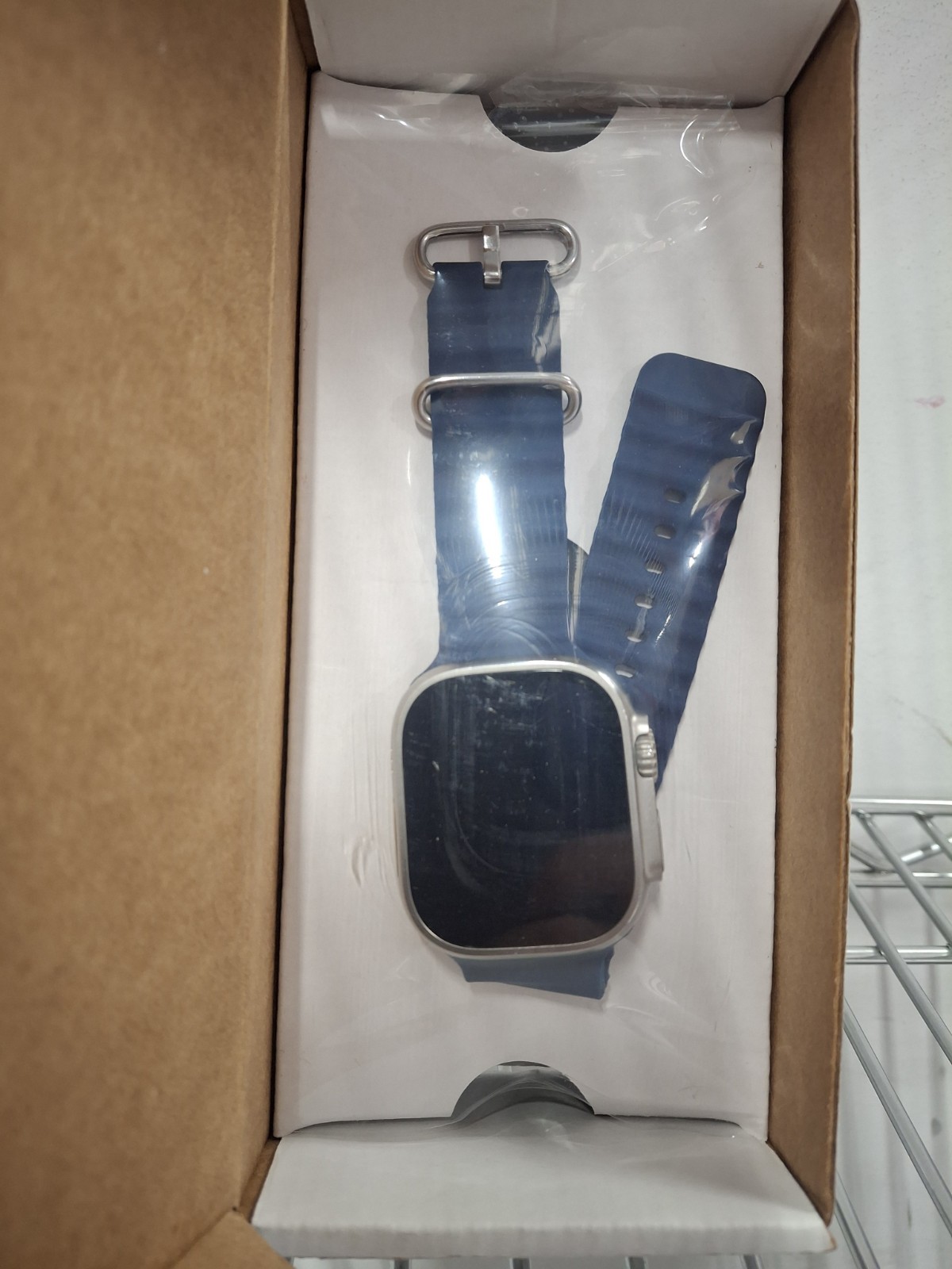 Apple Watch Ultra 2 / GPS / 49mm / Titanium case with blue ocean band / Ren