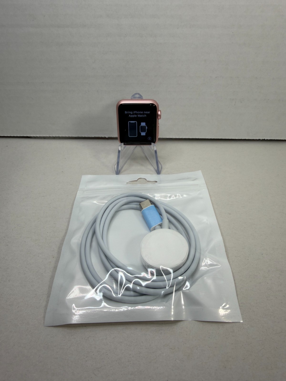 The Apple Watch Series 1 (A1802) 38mm Aluminum GPS Only Smartwatch 8GB Rose Gold