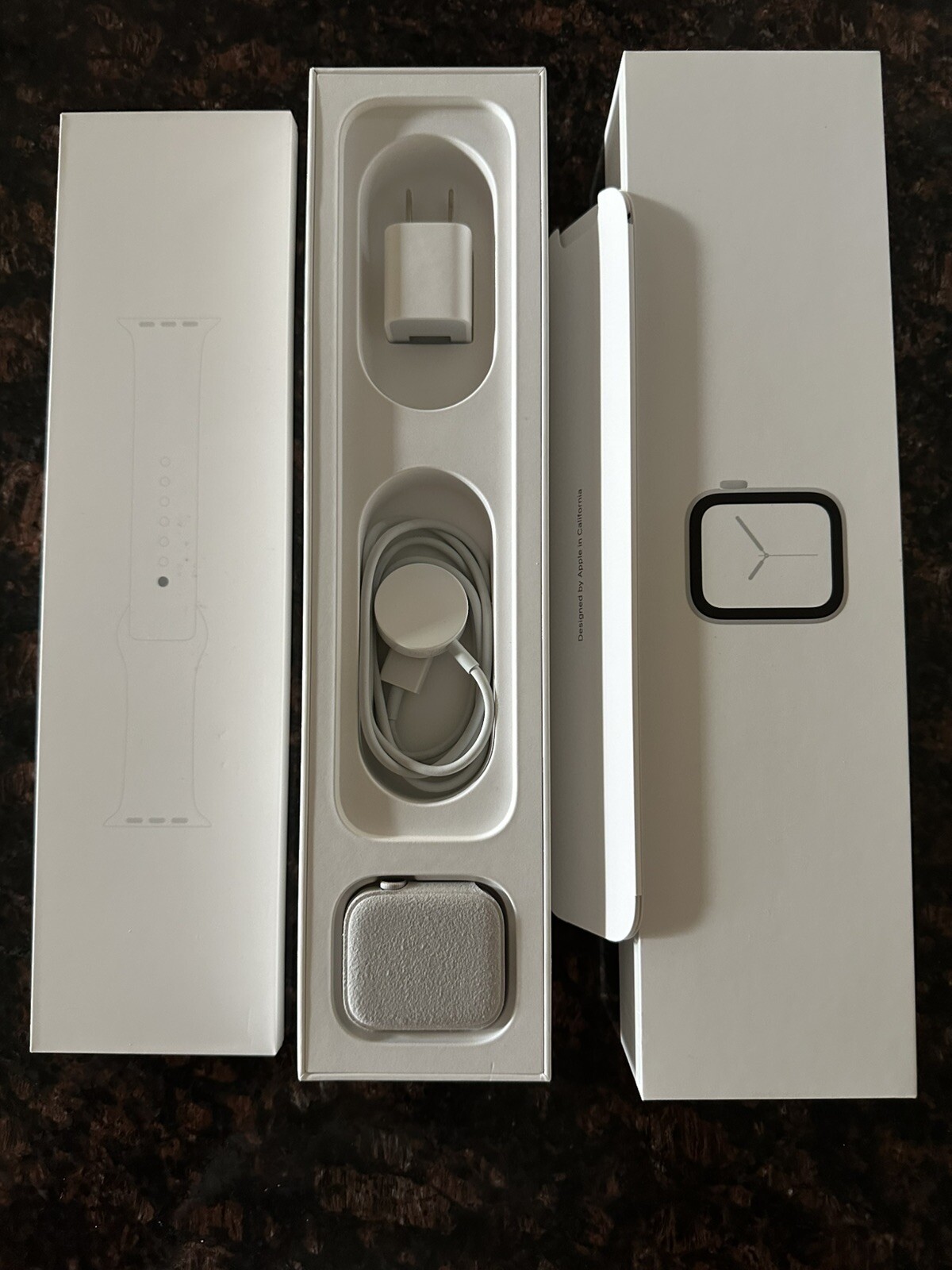 Apple Watch Series 4 44 mm Silver Aluminum Case with White Sport Band (GPS +…