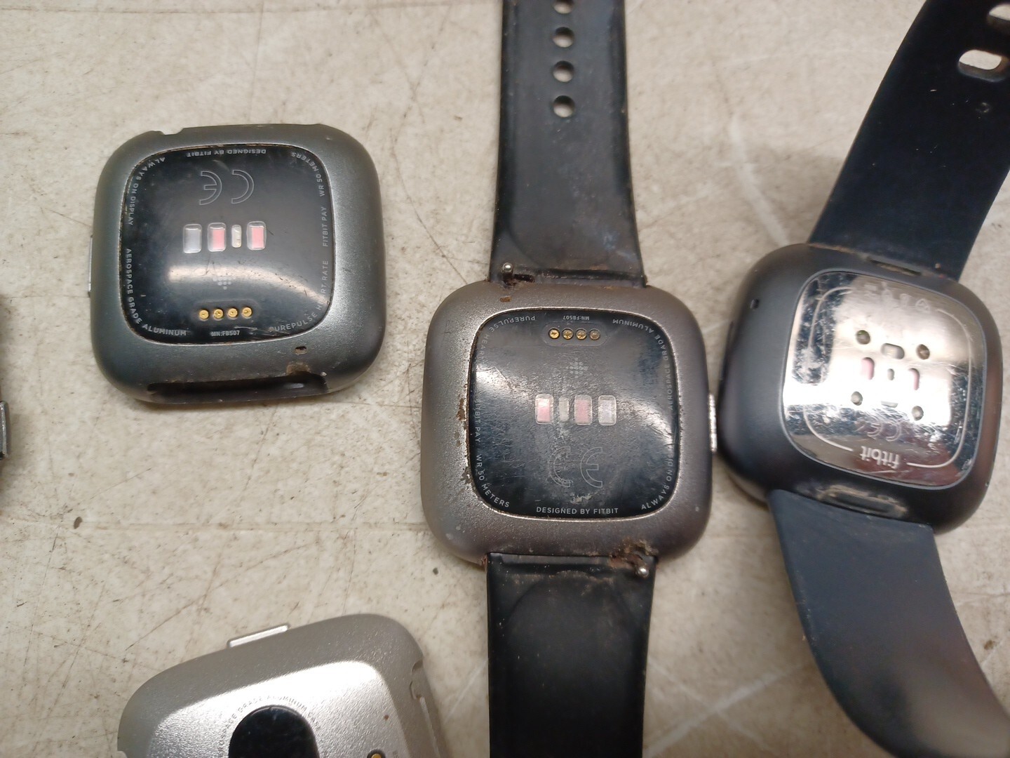RESALE PARTS REPAIR Lot of 9 Fit Bit Fit Tech Pay Versa Smart Watches FIX