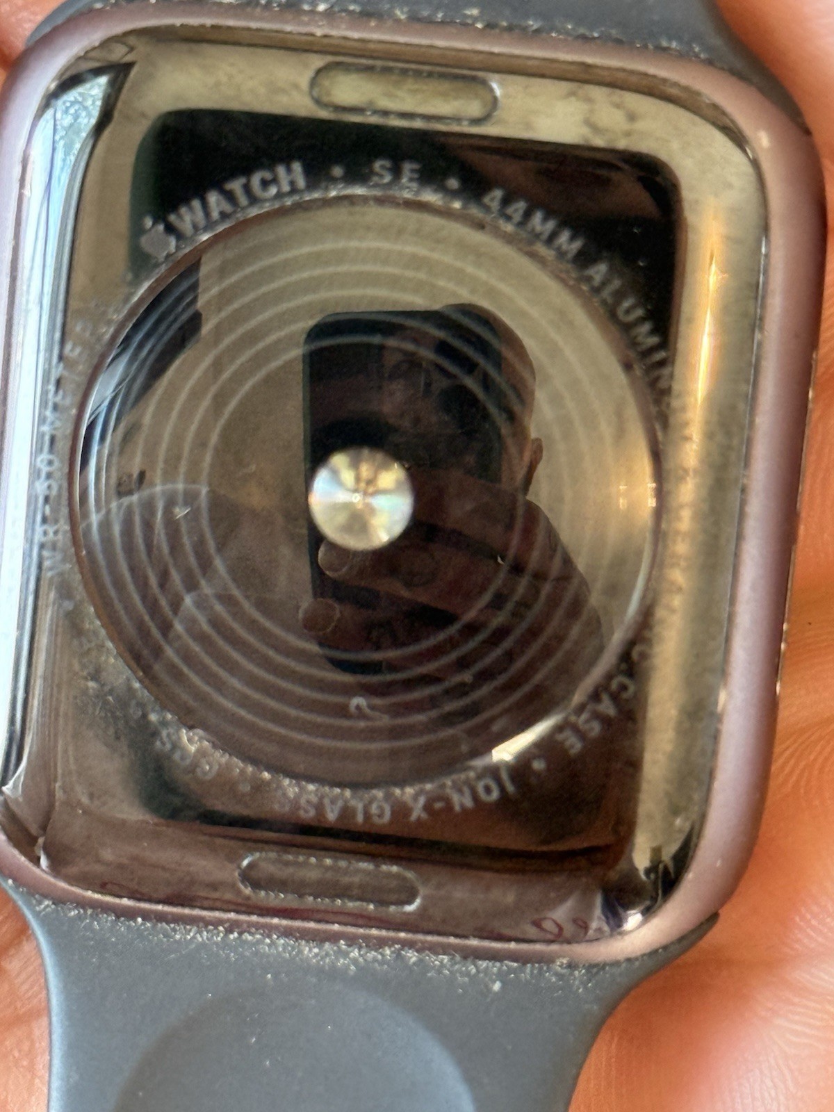 Two apple iPhones and two Apple Watches parts non working storage unit find
