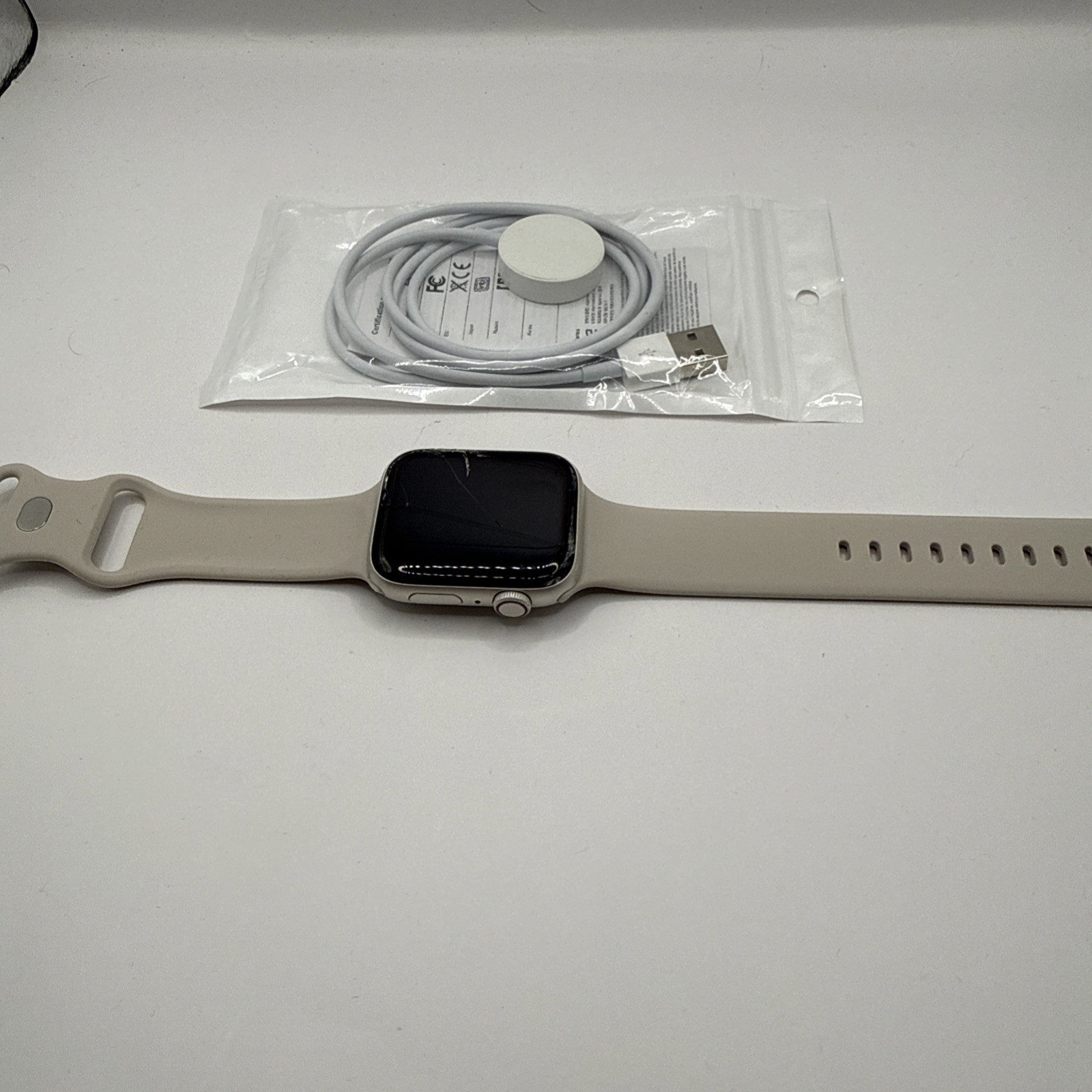 V493 Apple Watch SE 44mm (GPS + Cellular) Silver /white (Band + Charge)
