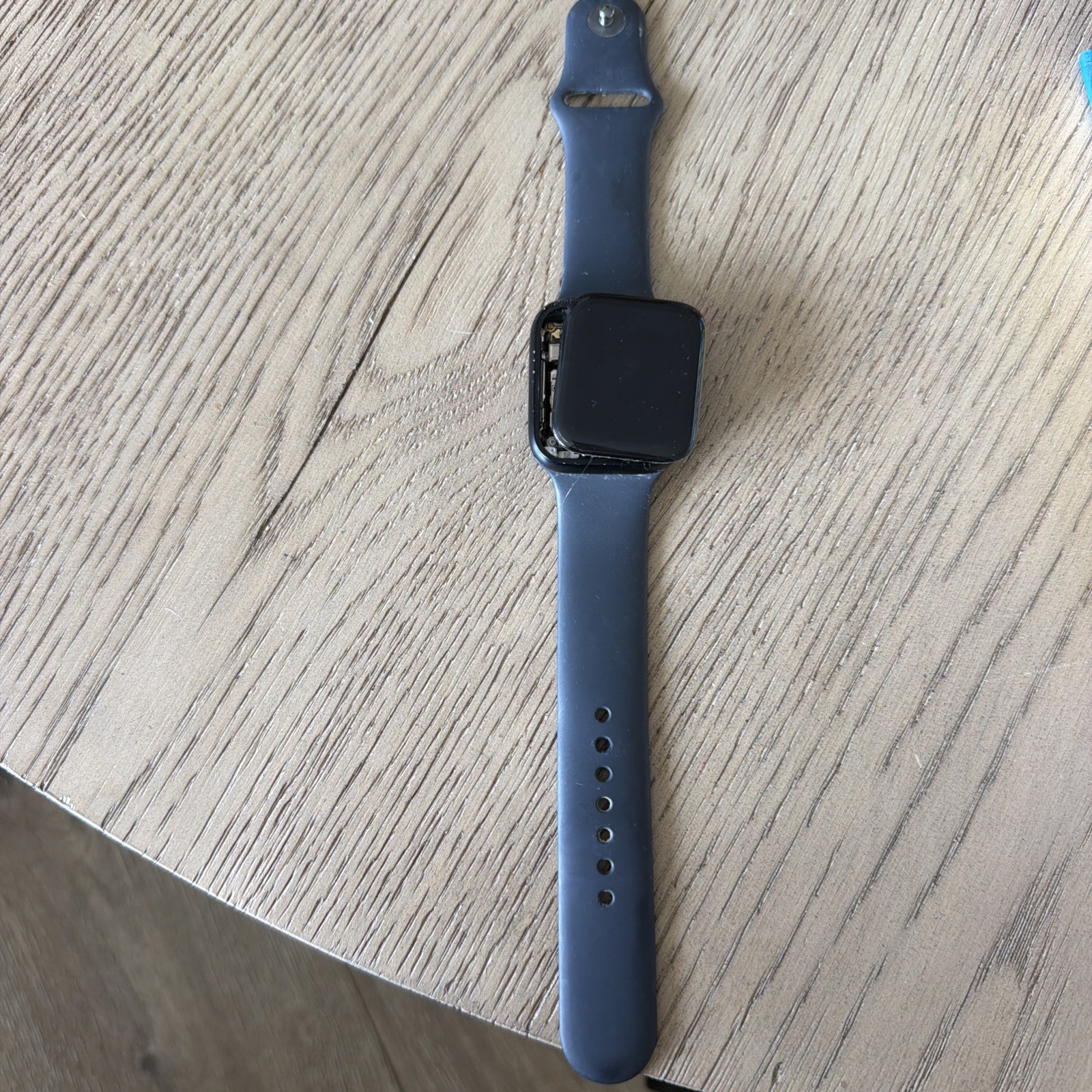 Apple Watch SE 44mm GPS Space Gray Aluminum Case with Black Sport Band.