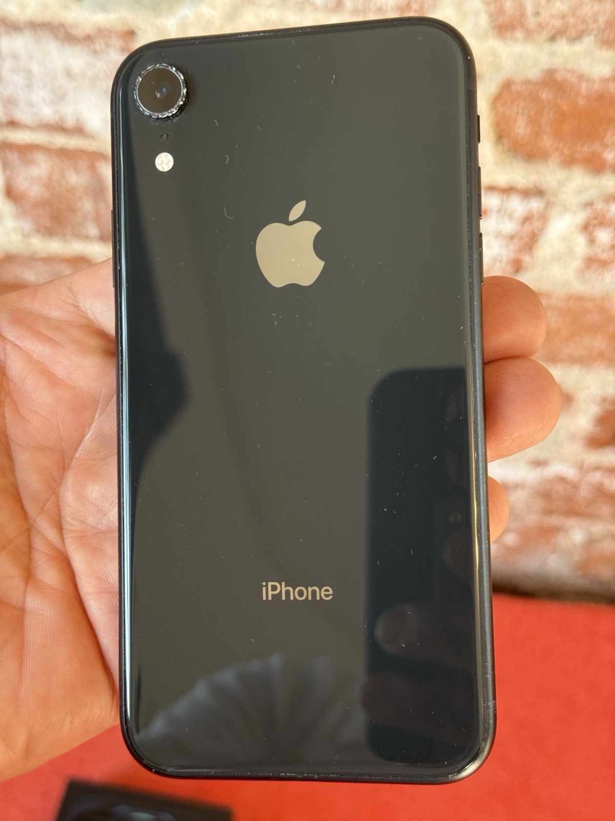 Two apple iPhones and two Apple Watches parts non working storage unit find
