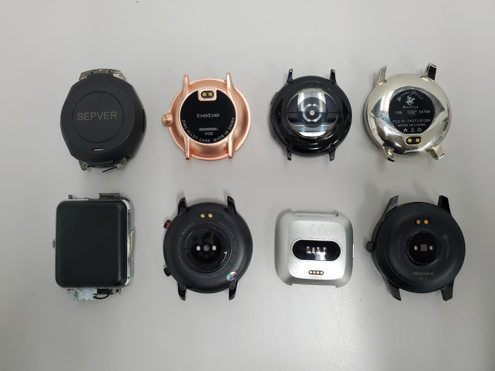 Lot of 8 Assorted Smart Watches & Fitness Devices NO CHARG NO BAND-FITBIT ITOUCH