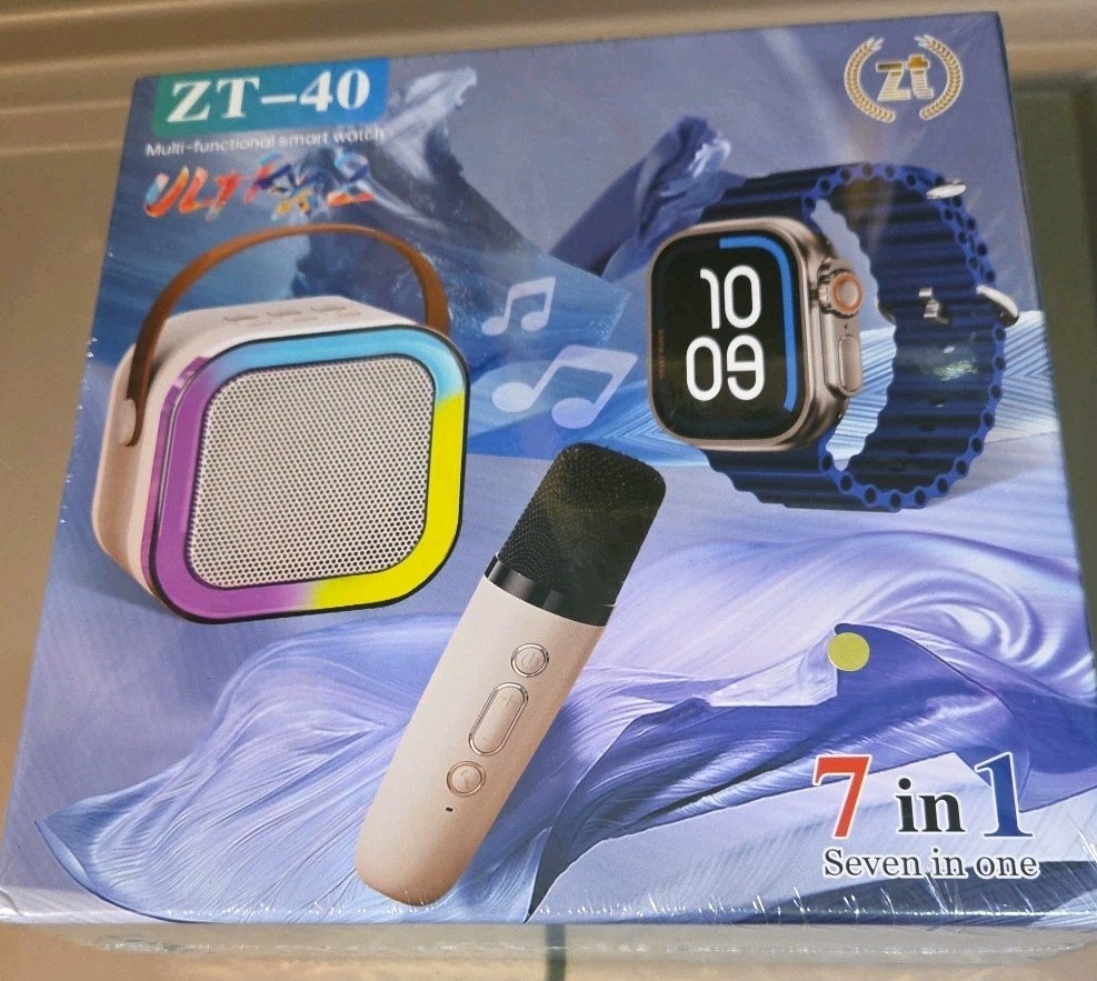 SMART WATCH WITH 4 WRIST BANDS AND A KARAOKE MACHINE!! NEW IN BOX!!