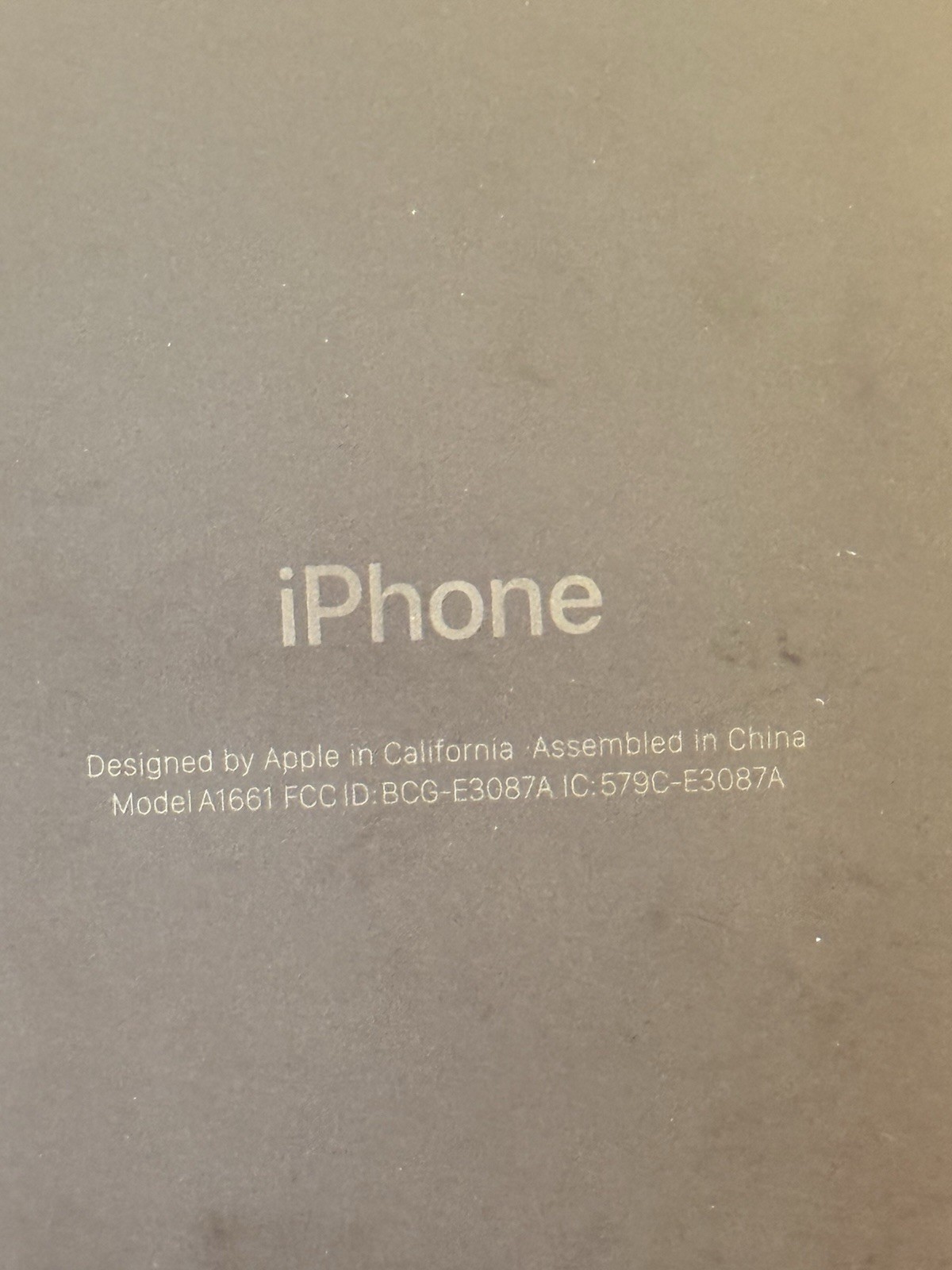 Two apple iPhones and two Apple Watches parts non working storage unit find