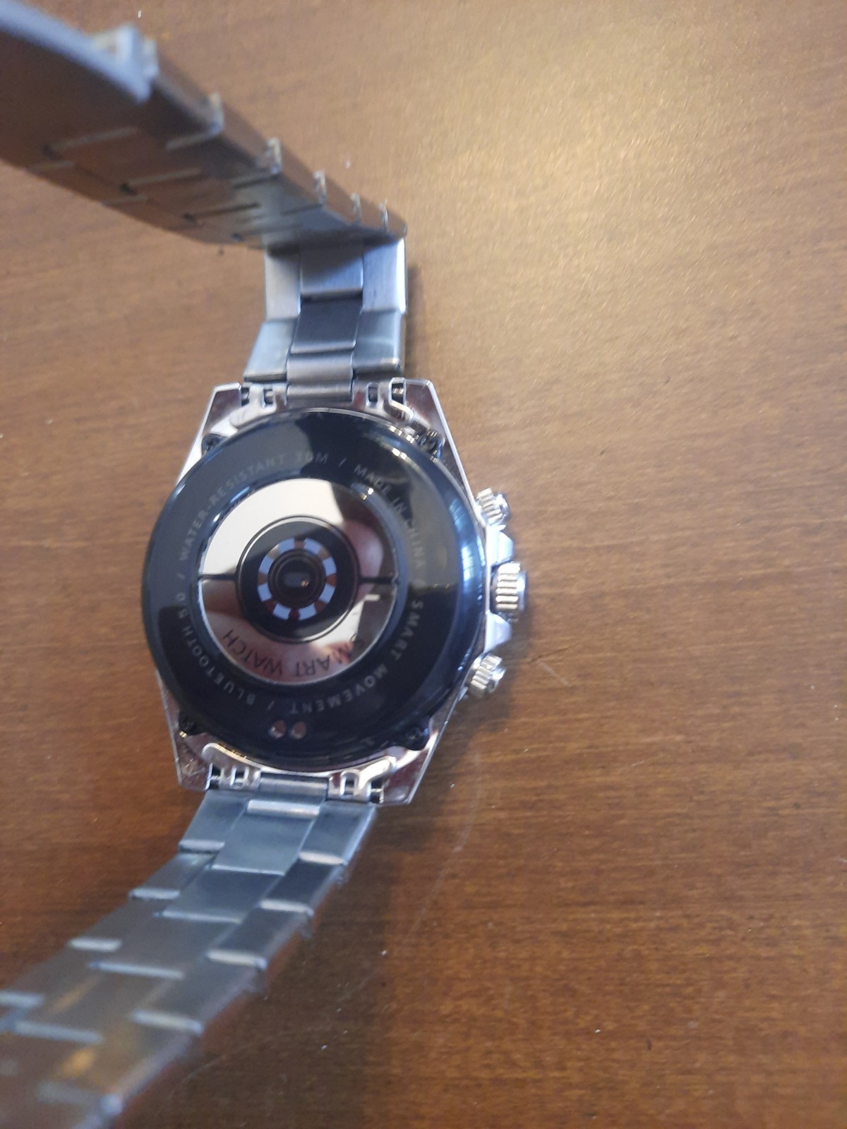 AW12 Stainless Steel Bluetooth Smart Watch Fitness Tracker with Rotating Bezel.
