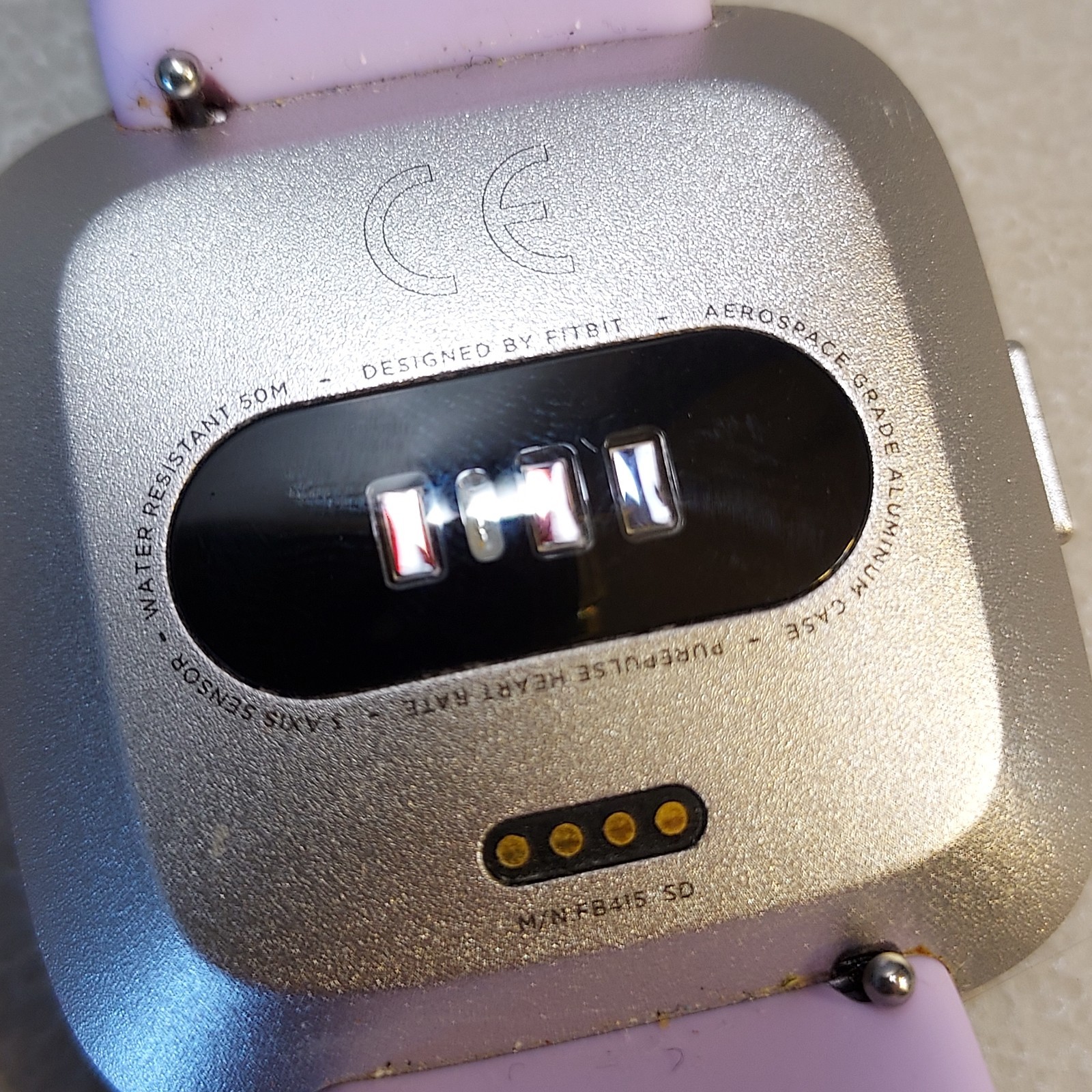 FB415 Fitbit Smartwatch w/ Lilac Silicone Wristband – Powers On