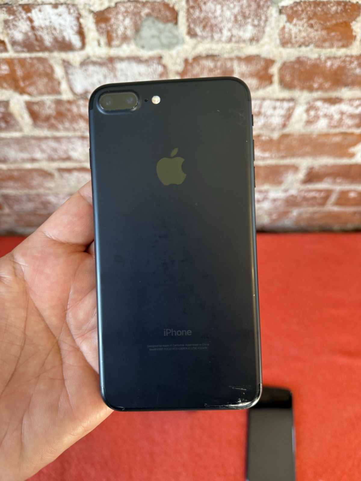 Two apple iPhones and two Apple Watches parts non working storage unit find