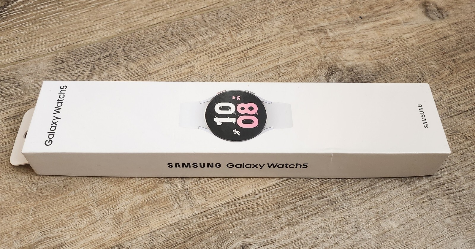 Samsung Galaxy Watch5 with White Sport Band
