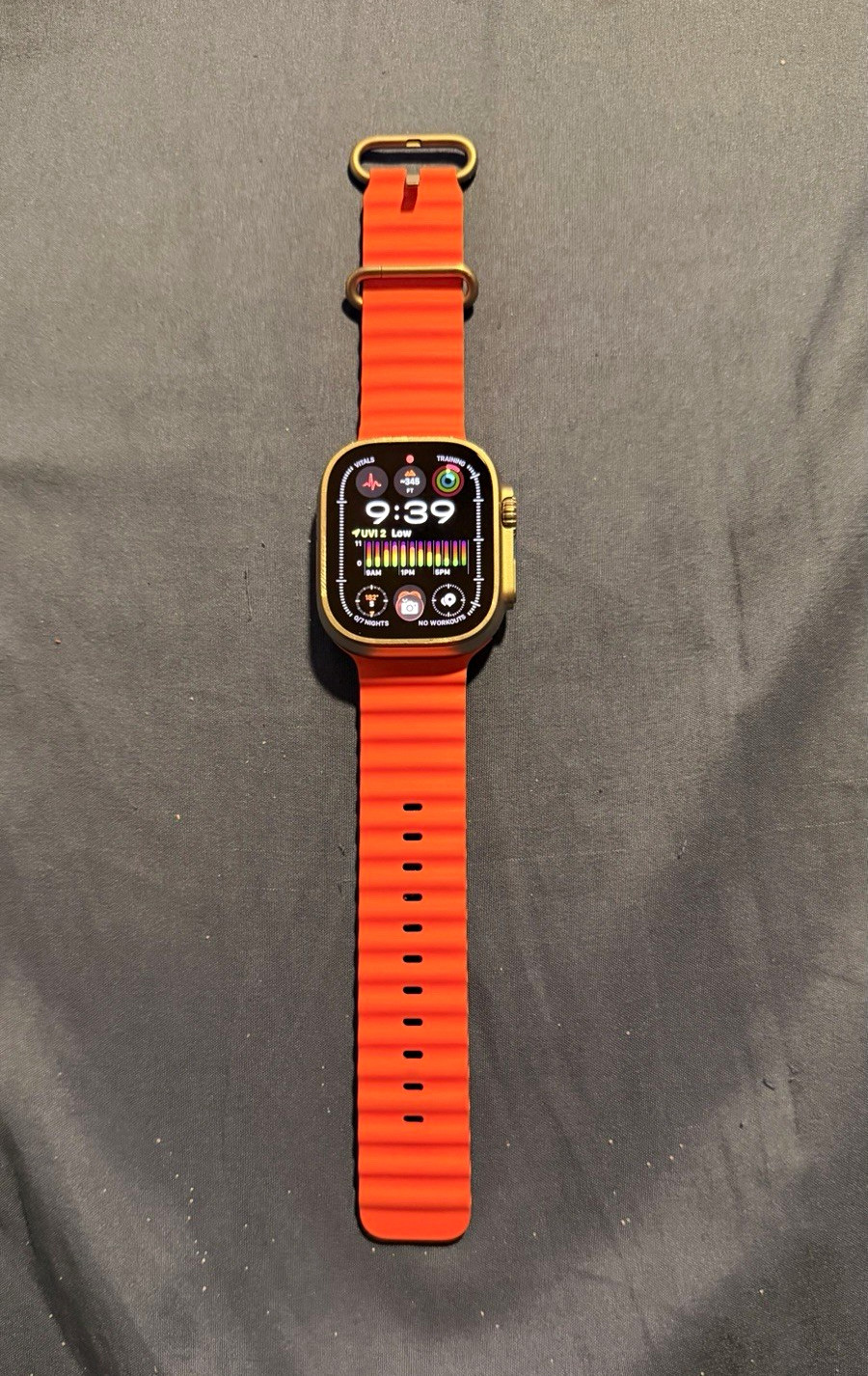 Apple Watch Ultra 2 49mm Titanium Silver LTE Orange Silicone Band.