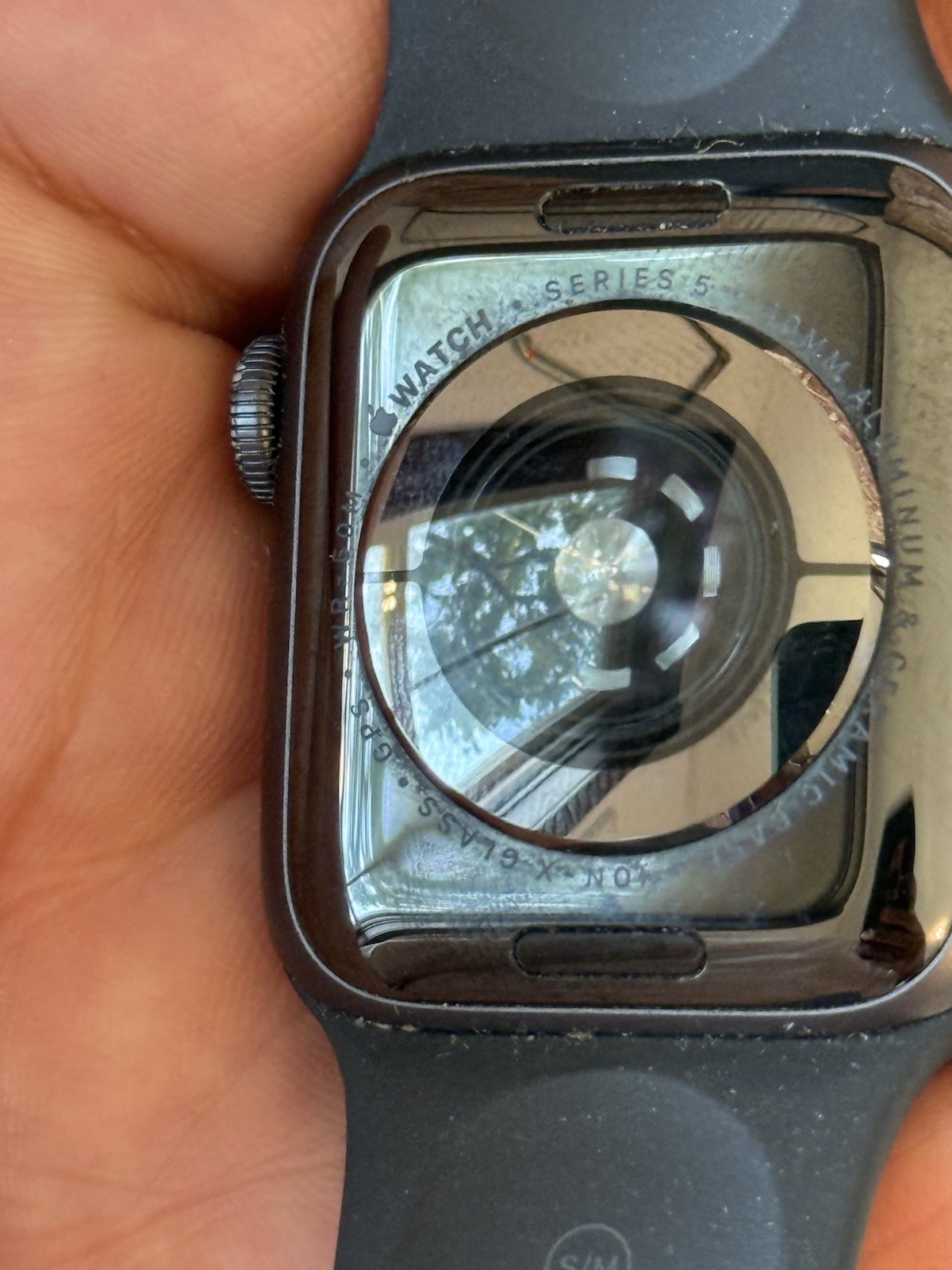Two apple iPhones and two Apple Watches parts non working storage unit find