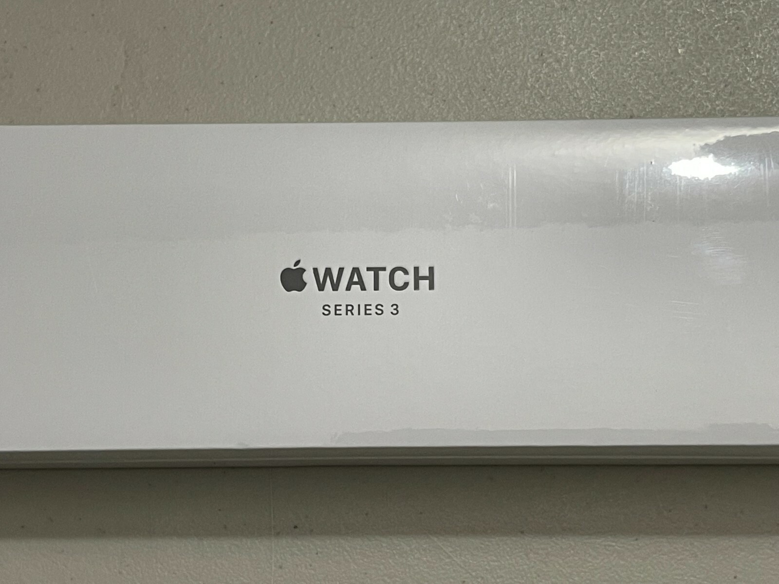 Apple Smart Watch Series 3 GPS 38 mm Silver Aluminum Case with White Sport Band.