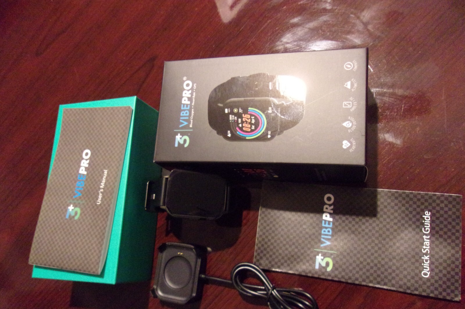 3+ VIBE PRO smart watch (gps, blood oxygen, heart rate, etc. with recharger).NIB